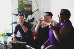 Three people enjoying a good time together during a work break.